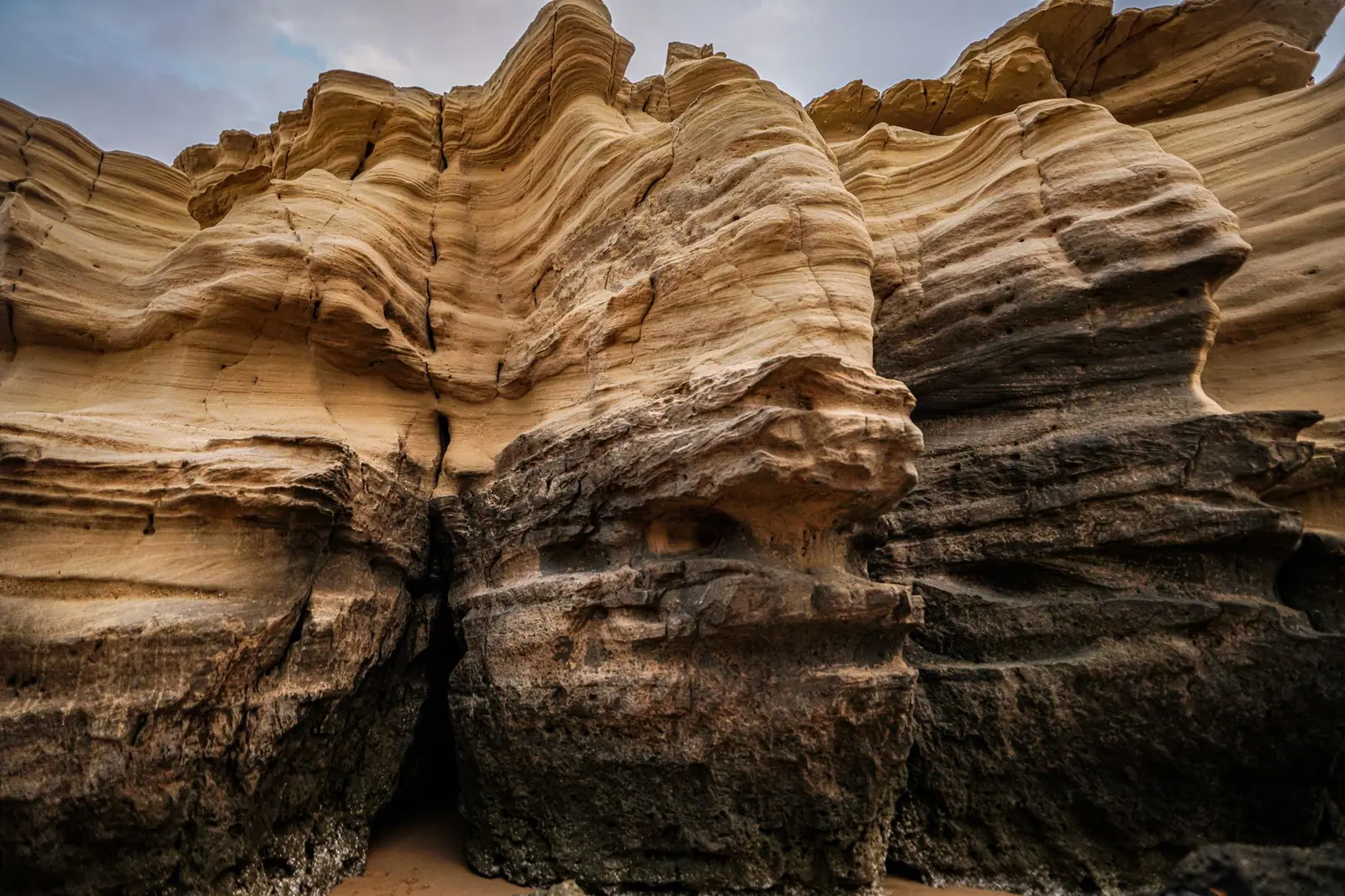 Layered sandstone formations shaped by erosion