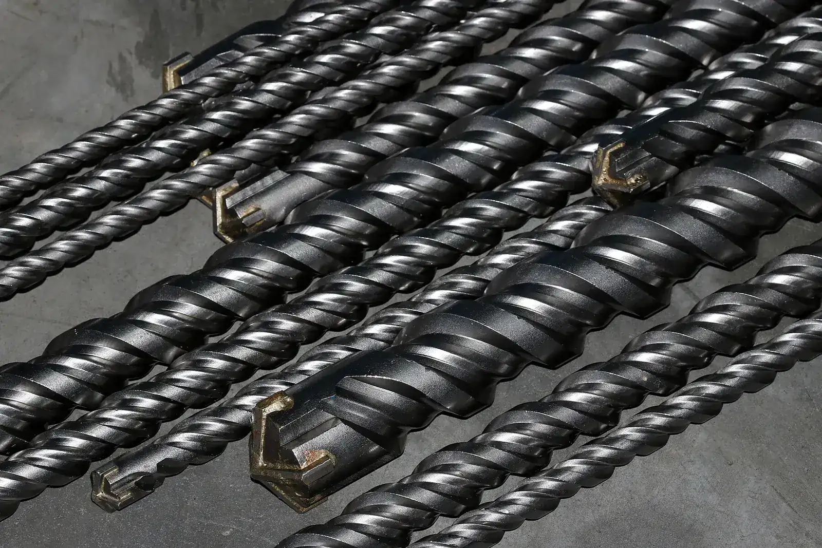 A row of drill bits with hex and SDS shanks
